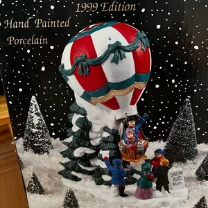 Festive Porcelain Hot Air Balloon with Family Scene